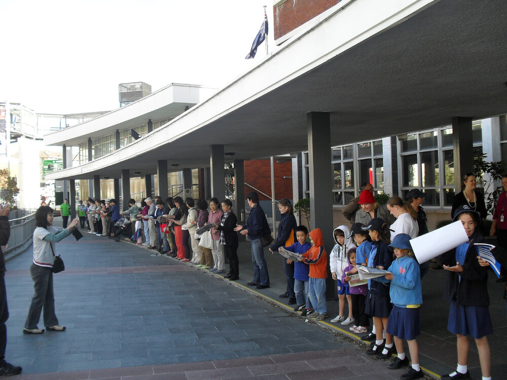 New Ryde Library community book pass : the line snaking from the hall