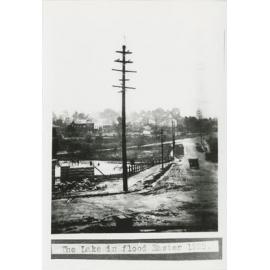 Looking down Hillview Road from Lakeside Road Eastwood at the lake in flood