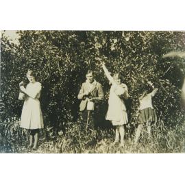 The Ekerick children in the orchard 