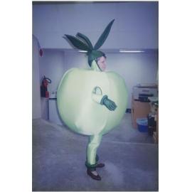 Person posing in a Granny Apple costume 