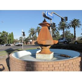 Queen Victoria Jubilee Fountain: view of monument, Victoria Road in background