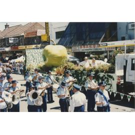 Marching band with the Ryde Council Granny Smith float