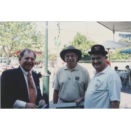 John Booth with unknown people 