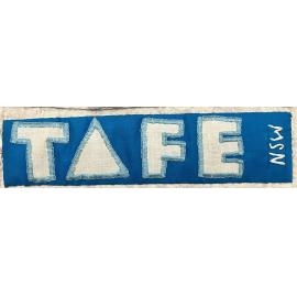 The Ryde Bicentenary quilt, 1992: close-up of TAFE logo