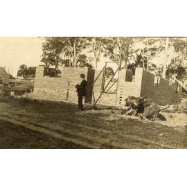 Herbert Gallop in front of his house under construction in Meadow Crescent, Meadowbank