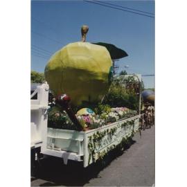 Granny Smith apple parade float with scouts