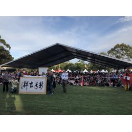 Group gathered on grass, Lunar New Year Festival, 2019