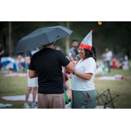 Couple enjoying Ryde's 'Cinema in the Park'
