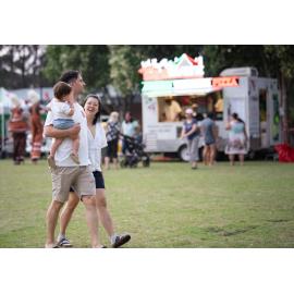 Family walking around at Ryde's 'Cinema in the Park'