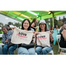  Two ladies holding Ryde's Love Meadowbank bags, Australia Day 2026