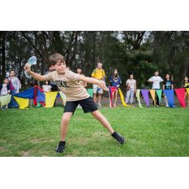 Young boy participating in the thong throwing competition, Australia Day 2026