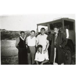 Arthur Beale and friends with truck in background 
