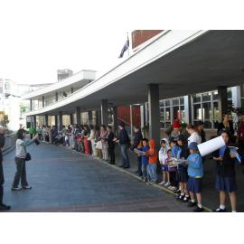 New Ryde Library community book pass : the line snaking from the hall