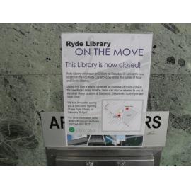 Library sign showing the new library location: taken during the book pass event