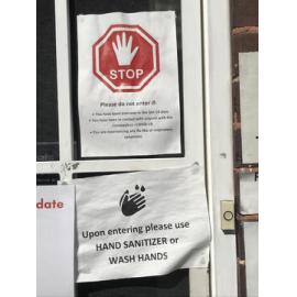 Christian Community Aid (CCA) building covid signage, April 2020