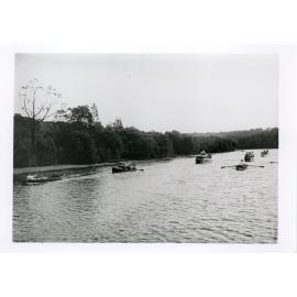 Rowing race between members of a picnic party - coming up from the bend of the river below "Fairyland", 1930s 
