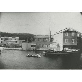Boating party on the Lane Cove River in front of Clifford Love's cornflour & starch mill